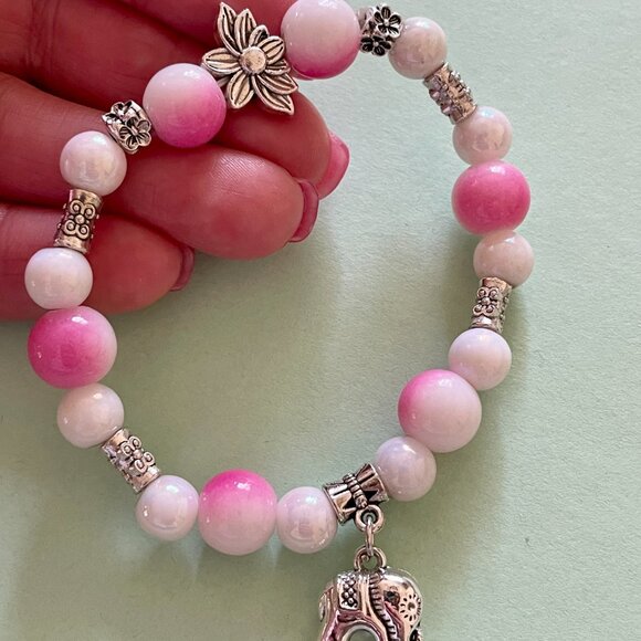 Handmade bracelet with beads and dangling elephant charm - Picture 6 of 7
